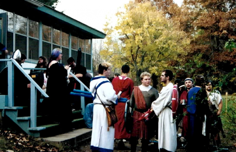 Gathering at the Back Steps of the Inn